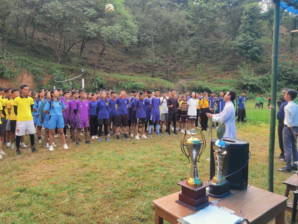 Rev Father Philip Magh inaugurating the ANSPA Kiphire Unit interschool volley ball and throw-ball tournament on October 7.